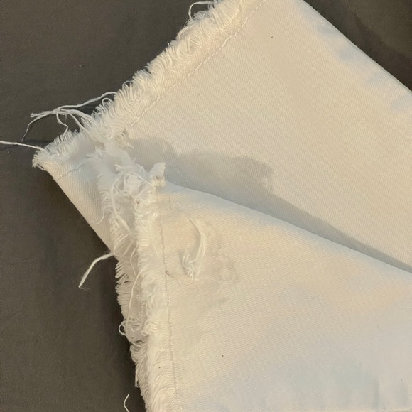 White skinny jeans with stretch and slightly distressed.  Never been worn. 27 - Picture 2 of 10